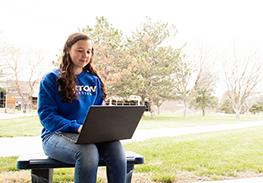 Student works on their computer
