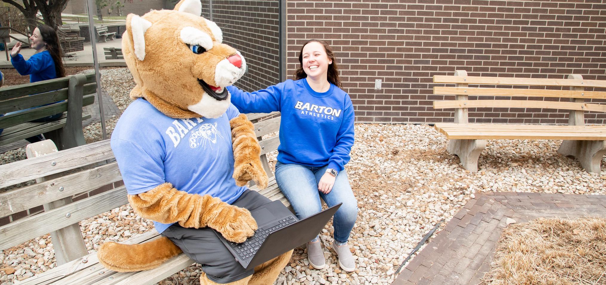 Bart hangs out with a student on campus