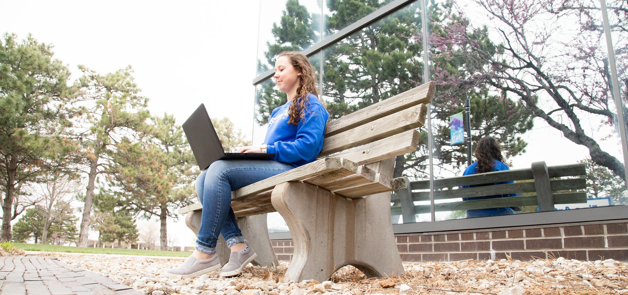 Student works on their computer